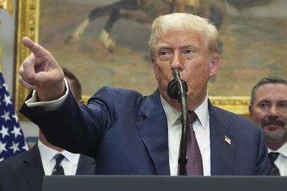 President Donald Trump speaks during an event to sign an executive order restarting the Presidential Fitness Test in public schools, Thursday, July 31, 2025, in the Roosevelt Room of the White House in Washington. (AP Photo/Jacquelyn Martin)