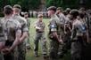 Members of the Coldstream Guards during a ceremony at Victoria Barracks, Berkshire, as they swap their green berets with a United Nations' beret. The change of headgear is the final step in the dual role of the soldiers' training and preparation prior to being deployed on peacekeeping duties in Cyprus. They will be the latest force to take up the role on Operation Tosca, the longest ongoing military operation in history. Operation Tosca is an unaccompanied six-month UN tour of duty and the soldiers are responsible for maintaining the integrity of the Buffer Zone that runs between the Greek and Turkish Cypriots including the capital Nicosia, which is the last city in the world to be divided by a demilitarised zone. Picture date: Thursday July 31, 2025. (Photo by James Manning/PA Images via Getty Images)