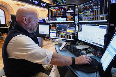 Trader Steven Gohl works on the floor of the New York Stock Exchange, Monday, July 21, 2025. (AP Photo/Richard Drew)